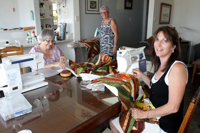 That's me in the black, making a quilt for an old RATG member who had been burnt out in a bushfire!